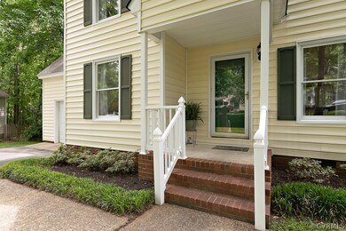 Welcome home!  Vinyl Railings with Brick Steps.