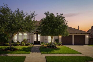 Twilight view of the front elevation