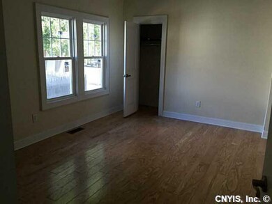 Bedroom With Hardwood Floors