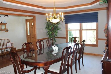 Formal dining room off the 2 story foyer.
