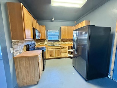 6310 25th St, Groves, TX 77619 - photo 5