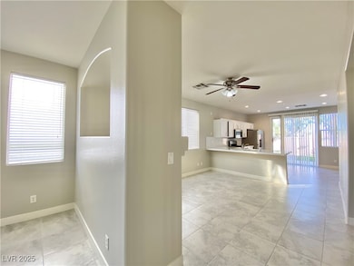 Unfurnished living room with plenty of natural lig