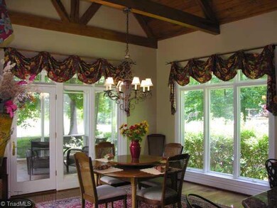 Other. Spacious breakfast room opens out to a wonderful terrace and into an inviting screened porch.