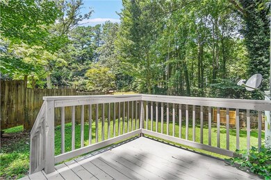 Deck with a fenced backyard