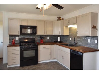 Painted Cabinets and New Back Spash Tile.  Solid S