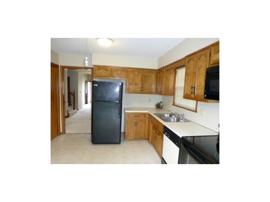 Kitchen with newer refrigerator that stays - washe