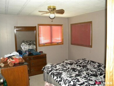MasterBedroom--has a single toilet and sink attached