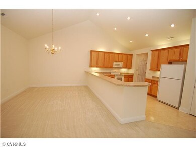 Kitchen - Open kitchen and dining area with vaulte
