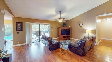 The spacious family room has easy access to the co