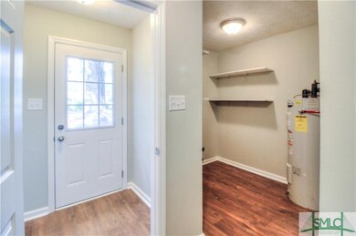 302 W 4th St, Springfield, GA 31329 - photo 6