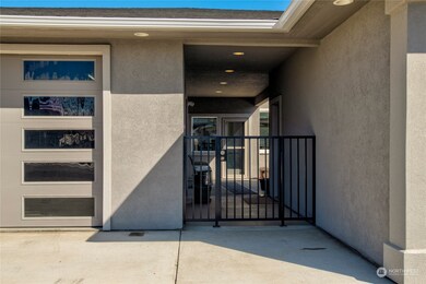 Gate at front entrance and garage