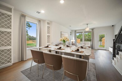 Dining area featuring stairs, visible vents, ceil