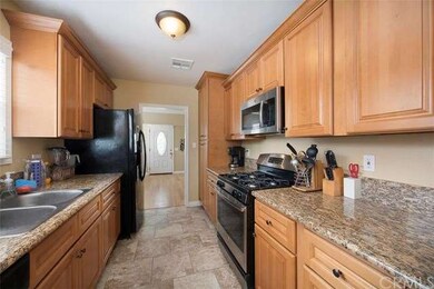 Kitchen with Front Door in the background. Note st