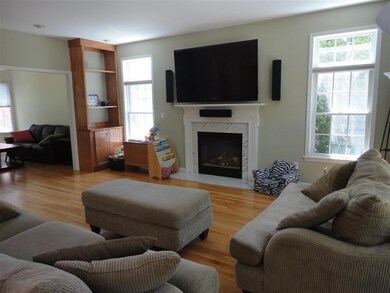 With a cozy gas fireplace
