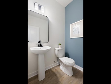 This thoughtfully designed powder room offers comfort and convenience in a chic space for guests while adding a touch of luxury to your home. *selections may vary from images
