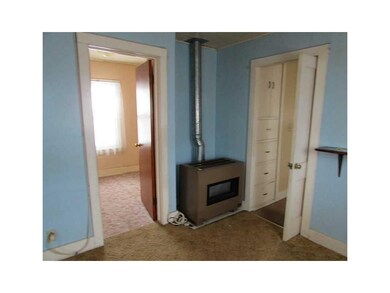 Living Room. Doorway to bedroom and newer appearin