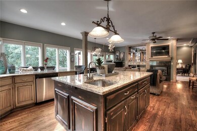 Granite, center island, stainless steel appliances
