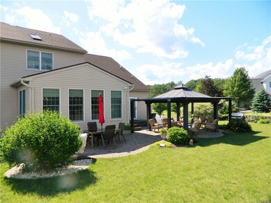 Back Yard w/ Paver Patio and Covered Seating