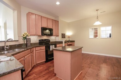 The large Eat-In Kitchen boasts lots of cabinets (