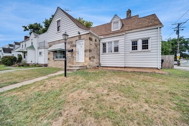 View of front of house featuring a front lawn
