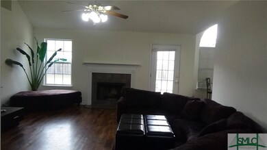 Living Room with wood burning fireplace