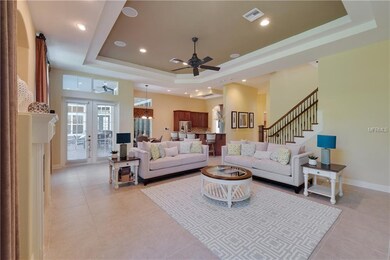 FAMILY ROOM FEATURES GAS FIREPLACE, TRAY CEILINGS,
