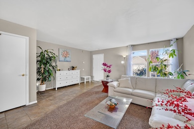 Living room featuring baseboards