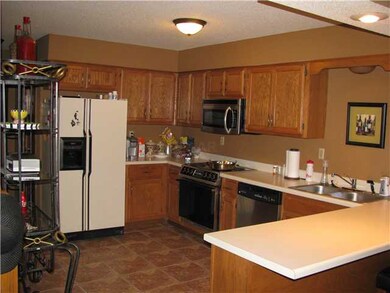 Kitchen Has black and Stainless Appliances, built-