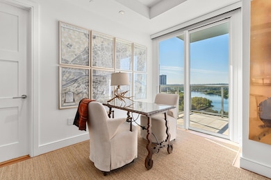 Office space with a water view and recessed light