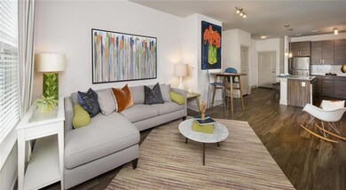 Living room featuring dark wood-type flooring