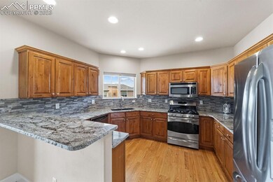 Granite counters and views of Cheyenne Mt.