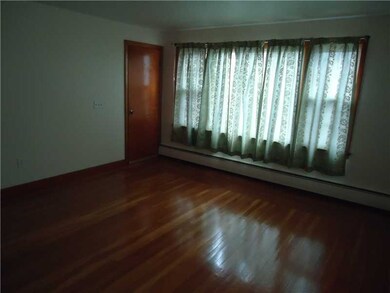 Living Room. GLEANING HARDWOODS HIGHTLIGHT THIS LA