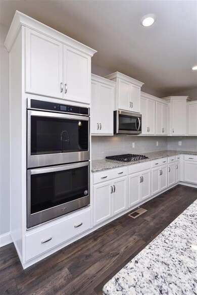 Kitchen w/Double Ovens (pictures are not of actual
