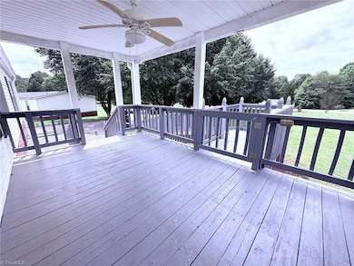 Front Covered Deck w/ Fan and handicap ramp