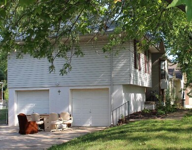 SIDE GARAGES , WITH LARGE DRIVEWAY
