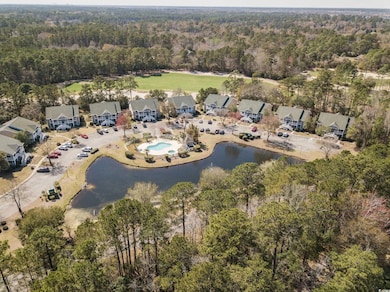 Drone / aerial view featuring a forest view and a 