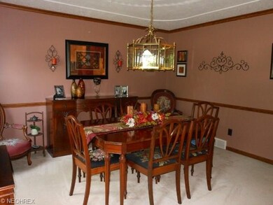 Spacious master bedroom with ceiling fan has his a