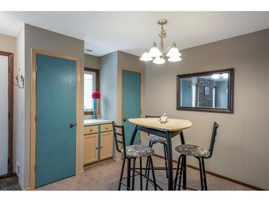 Ample dining room with storage and buffet.