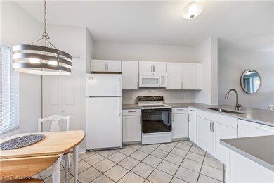 725 Saratoga Cir unit 102, Naples, FL 34104 - photo 6