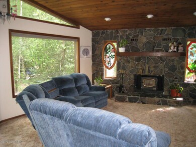 Living Room With Cathedral TNG Ceiling