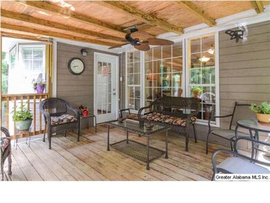 Immense covered deck with access to kitchen and wi