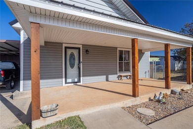 Entrance to property with a porch