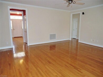 Great Room with hardwood floors which were installed by the current owner.