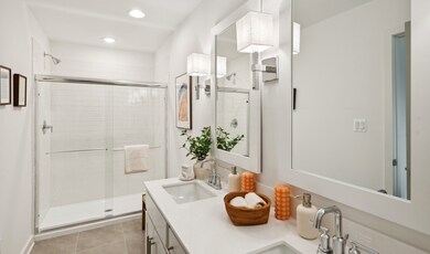 Primary bath with glass-shower enclosure