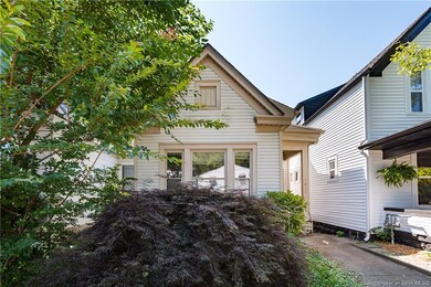 Beautiful mature Hawaiian maple graces front lands