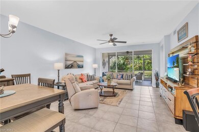 Tiled living room with ceiling fan