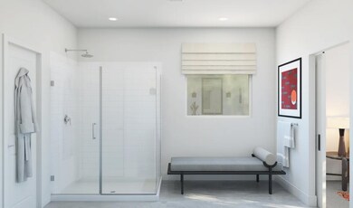 Primary bath with glass shower enclosure
