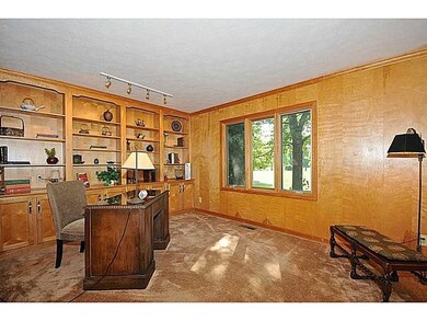 Office. Paneled office large room with built in bookcase