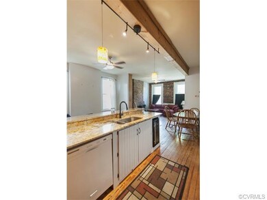 A view from the kitchen.  This unit features white