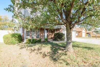 Large Tree in Front Yard & Landscaped Flowerbeds
